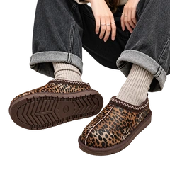 Leopard braided clogs styled with charcoal jeans