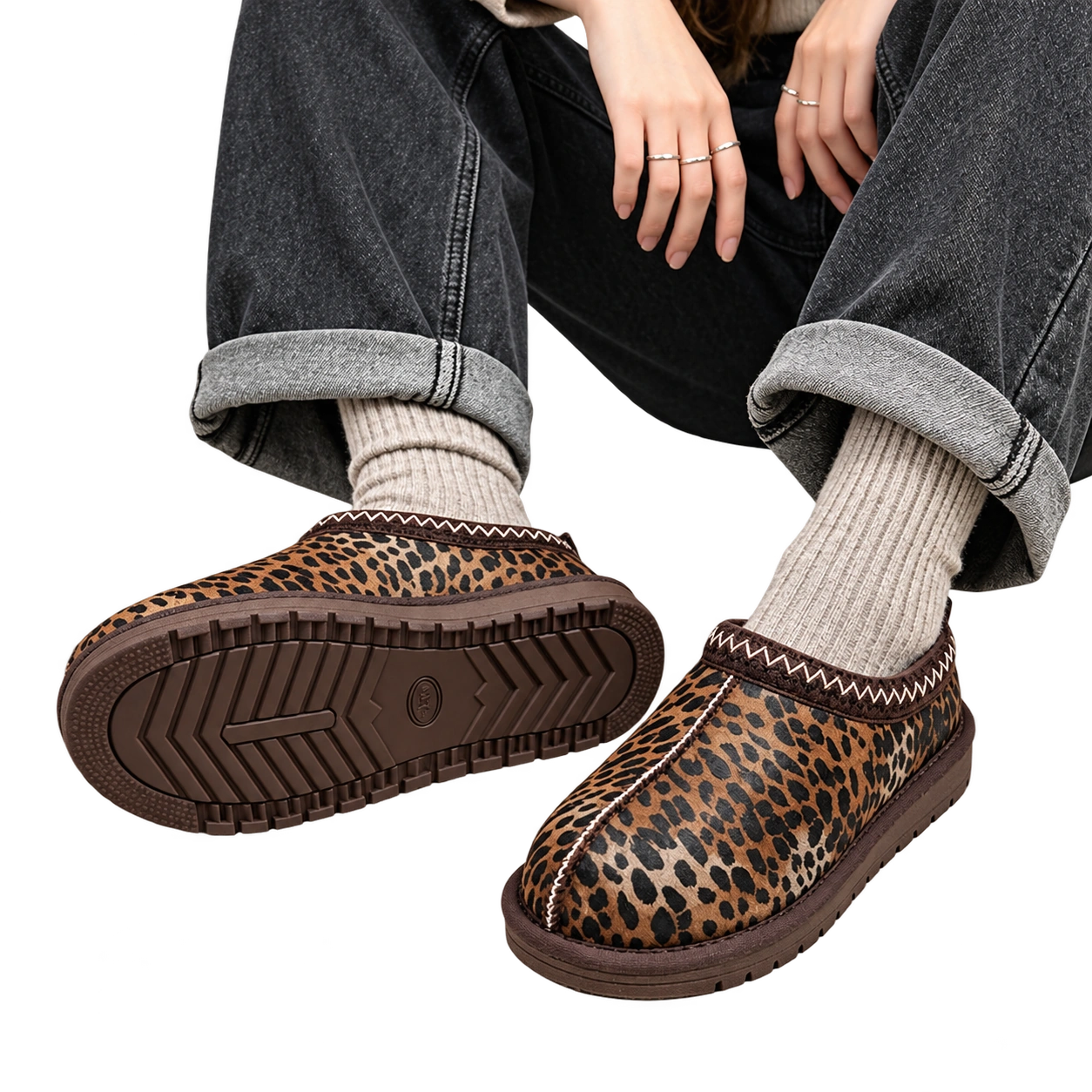 Leopard braided clogs styled with charcoal jeans