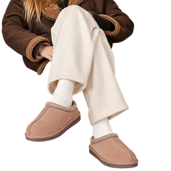 Mushroom braided clogs styled with cream trousers
